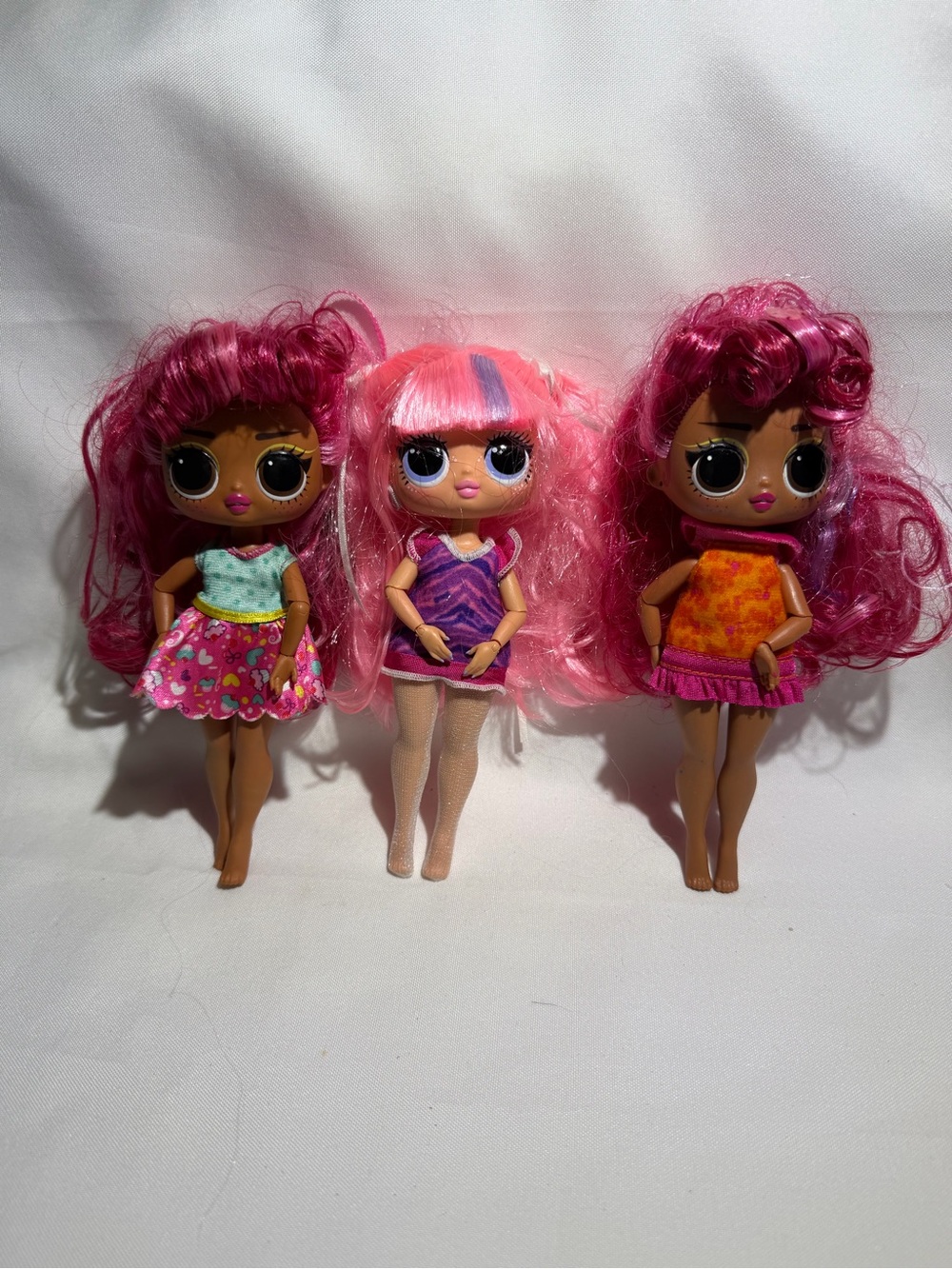 L.O.L. Surprise! Trio of Pink and Magenta Hair Dolls
